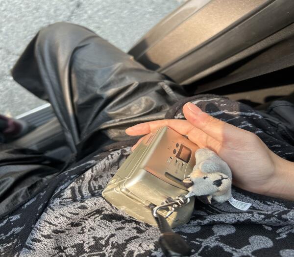 Lost Olympus film Camera with a pendant